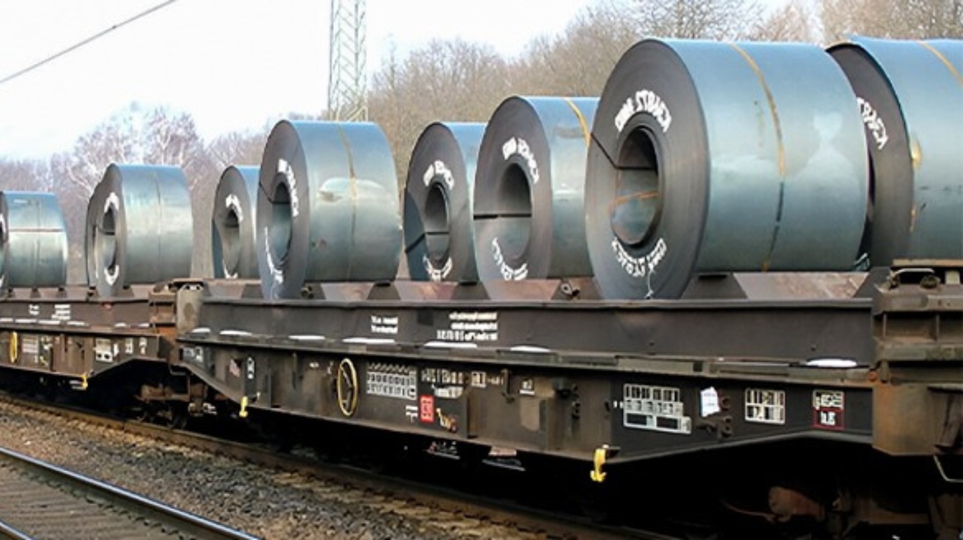 Heavy industrial goods in open railway wagons